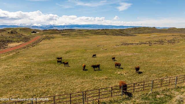 exterior space featuring a mountain view and a rural view