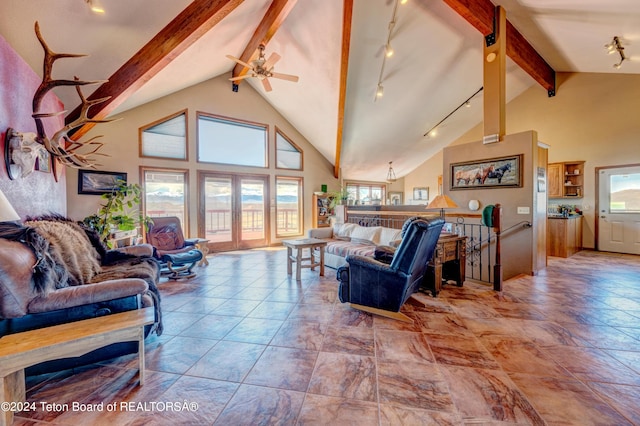 living room featuring beam ceiling, high vaulted ceiling, ceiling fan, and tile floors