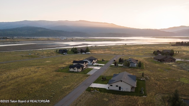 aerial view at dusk with a mountain view