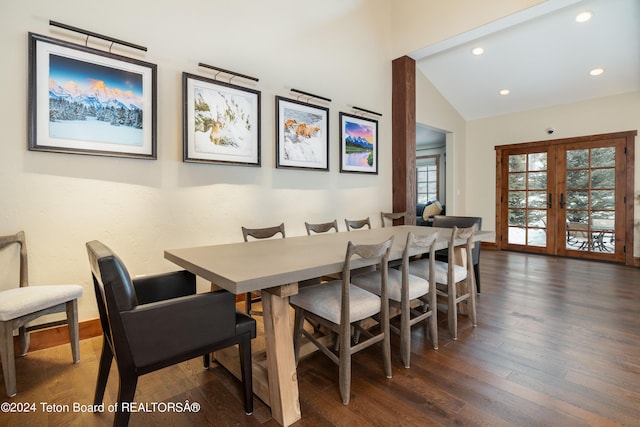 dining space featuring french doors, dark hardwood / wood-style flooring, and vaulted ceiling