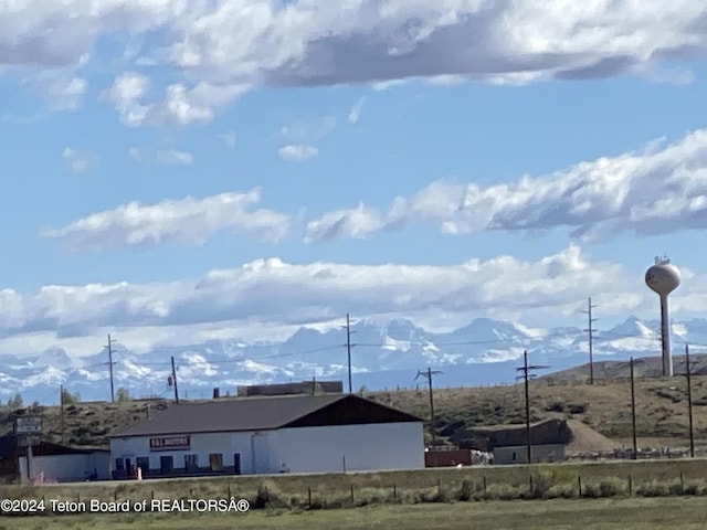 exterior space featuring a mountain view