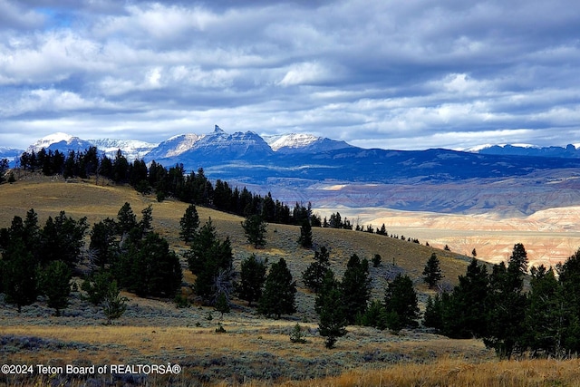 mountain view featuring a rural view