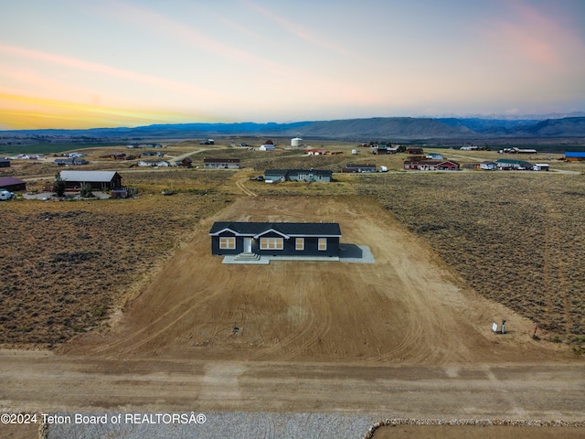 aerial view at dusk with a rural view