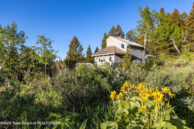 6105/6155 N Fish Creek Rd, Wilson, WY 83001 - view of home's exterior with board and batten siding