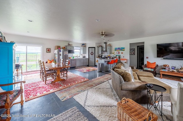 living room featuring ceiling fan