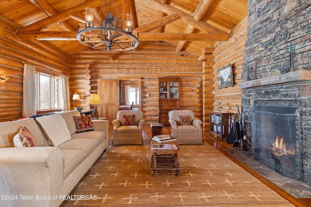 living room with a notable chandelier, log walls, high vaulted ceiling, and beamed ceiling