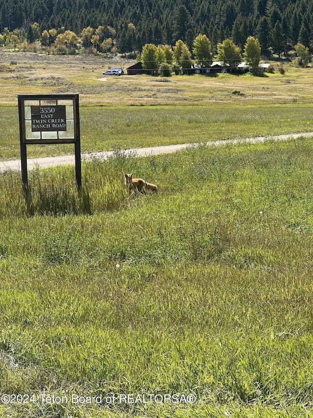 property view of mountains featuring a rural view