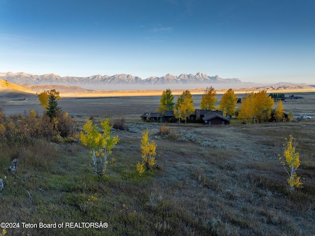 property view of mountains featuring a rural view