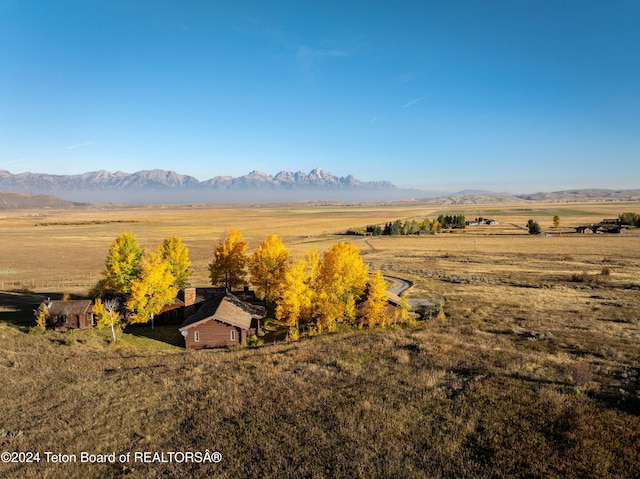 view of mountain feature with a rural view