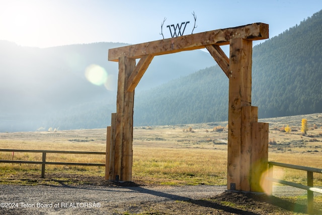 exterior space featuring a rural view and a mountain view