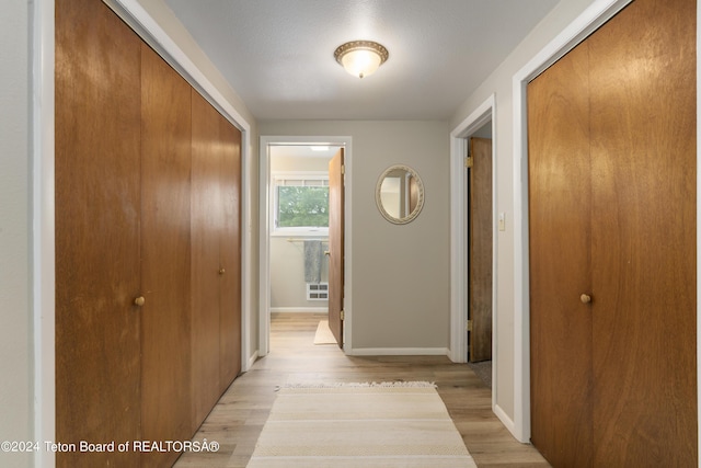 hall featuring light wood-type flooring