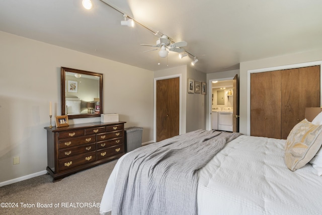 bedroom featuring ceiling fan, washing machine and dryer, light carpet, and ensuite bath