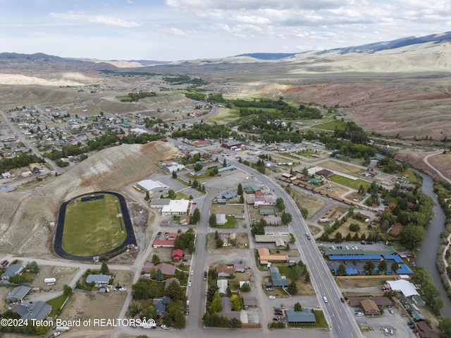 bird's eye view with a mountain view