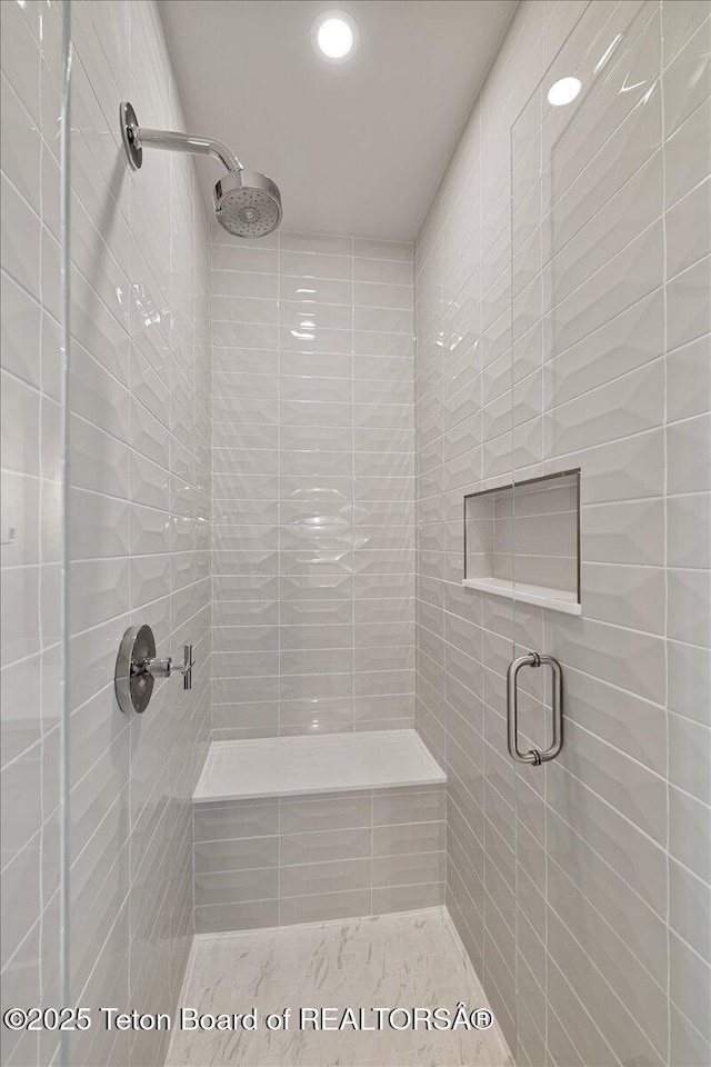 full bath featuring a stall shower and recessed lighting