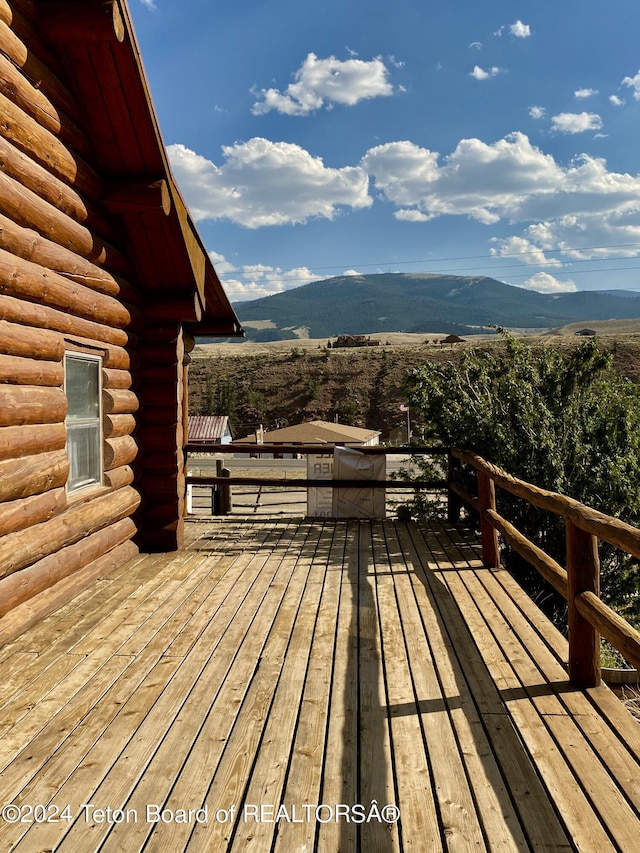 1404 Warm Springs Dr, Dubois, WY 82513 - wooden terrace featuring a mountain view