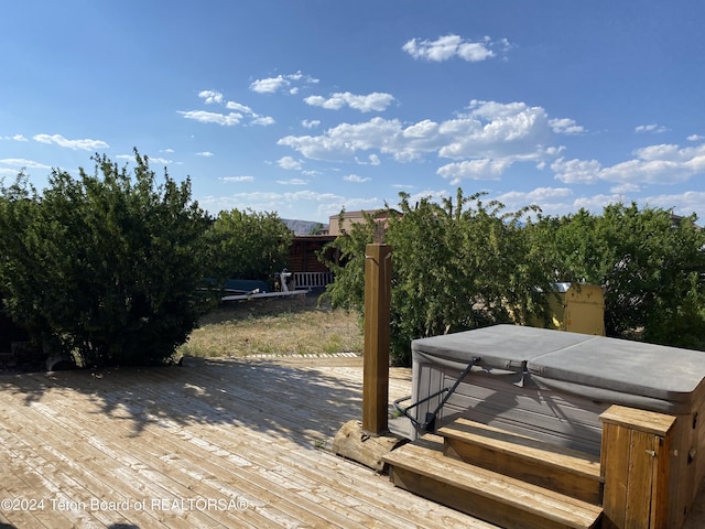 1404 Warm Springs Dr, Dubois, WY 82513 - deck featuring a hot tub