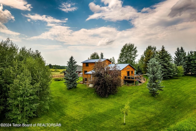 view of yard with a wooden deck