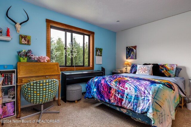 bedroom featuring carpet flooring