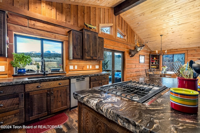 kitchen featuring appliances with stainless steel finishes, wooden walls, sink, dark hardwood / wood-style flooring, and beam ceiling