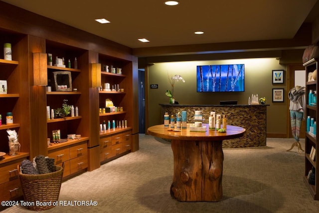 bar with recessed lighting and light colored carpet