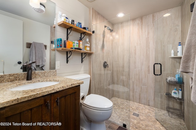 1655 E J-W Dr, Jackson, WY 83001 - full bath featuring toilet, vanity, and a stall shower