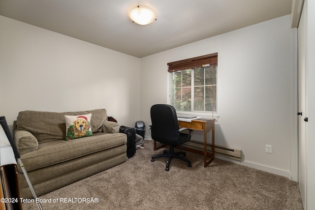 carpeted office space featuring baseboard heating