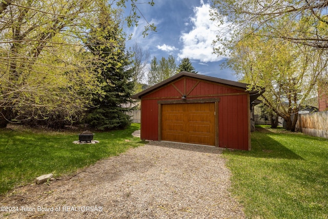 garage with a yard