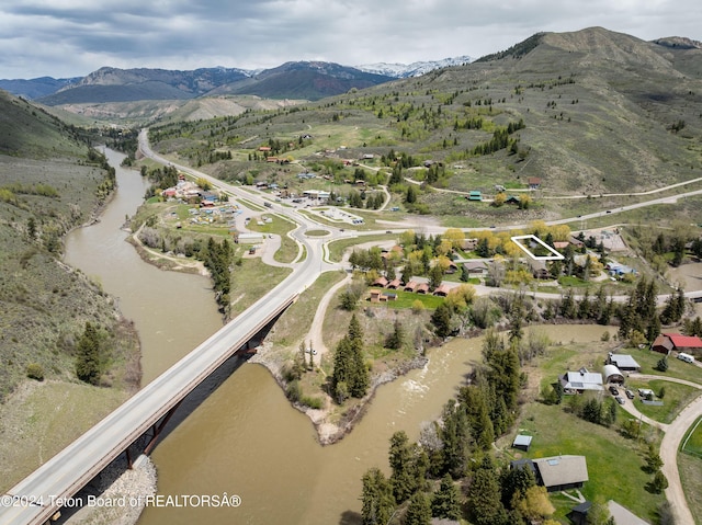 1655 E J-W Dr, Jackson, WY 83001 - drone / aerial view featuring a water and mountain view