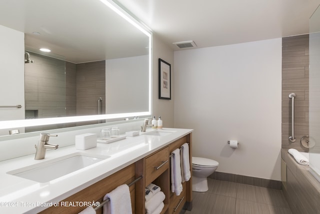 full bathroom featuring tile patterned floors, vanity, toilet, and plus walk in shower