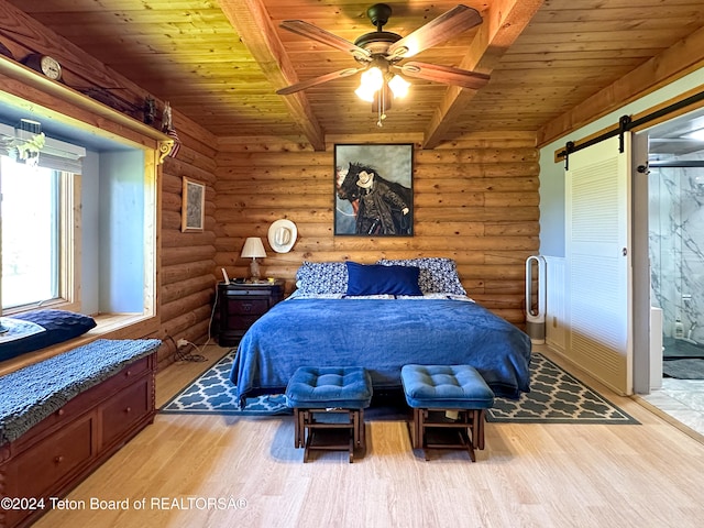 bedroom featuring wood ceiling, log walls, ceiling fan, a barn door, and hardwood / wood-style floors