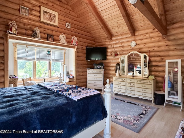 bedroom with log walls, beamed ceiling, hardwood / wood-style floors, high vaulted ceiling, and wooden ceiling