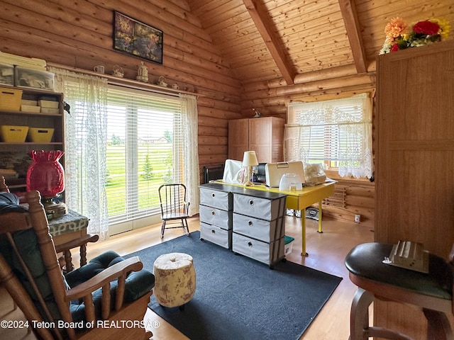 office space with wooden ceiling, a wealth of natural light, rustic walls, and light wood-type flooring