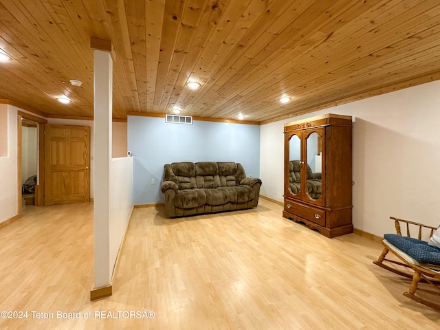 living area featuring light hardwood / wood-style floors, ornamental molding, and wood ceiling