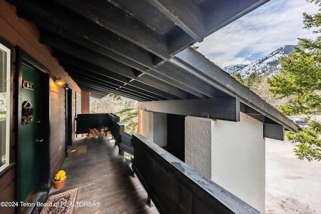 view of property exterior with a mountain view