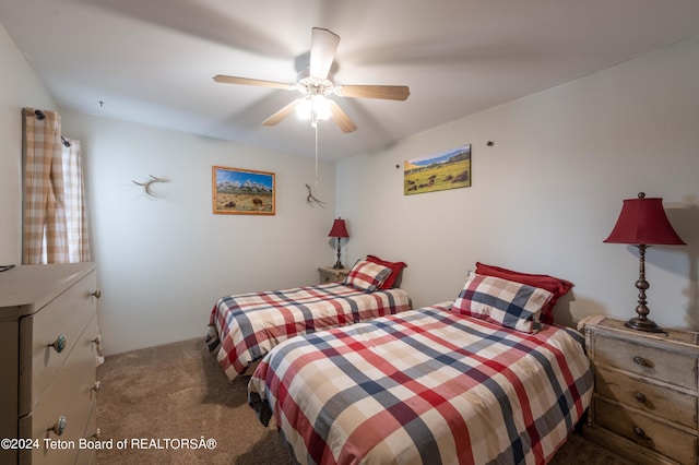 carpeted bedroom featuring ceiling fan