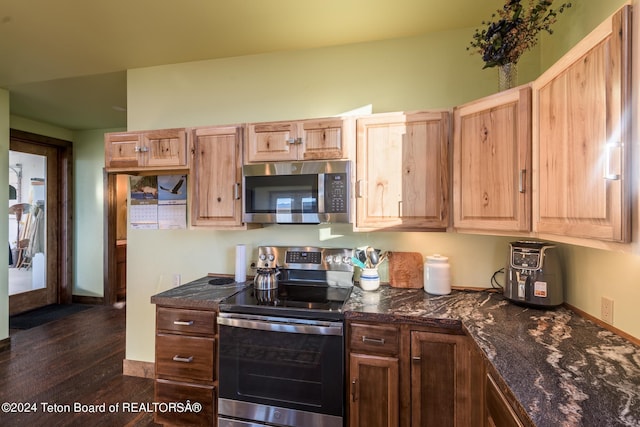 78 E Fork Big Sandy, Boulder, WY 82923 - kitchen with appliances with stainless steel finishes, dark wood-type flooring, light brown cabinets, and dark stone countertops