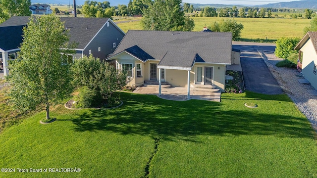 rear view of property with a patio area