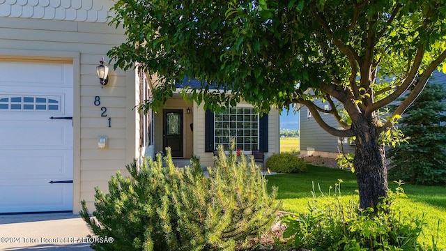 entrance to property featuring a garage