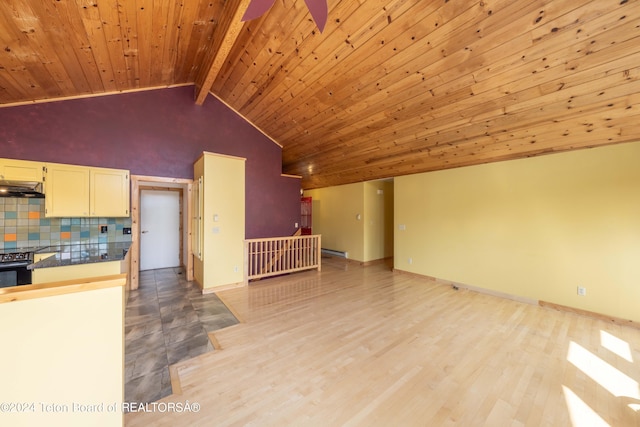 unfurnished living room with high vaulted ceiling, wooden ceiling, baseboards, light wood finished floors, and beamed ceiling