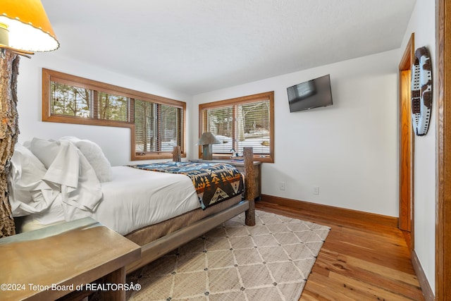 bedroom featuring hardwood / wood-style flooring