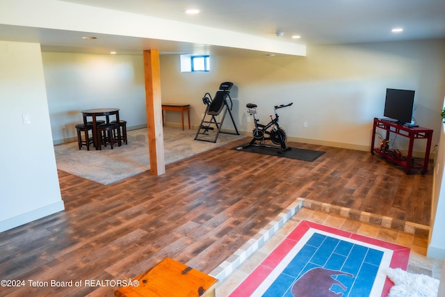 workout room featuring dark hardwood / wood-style floors