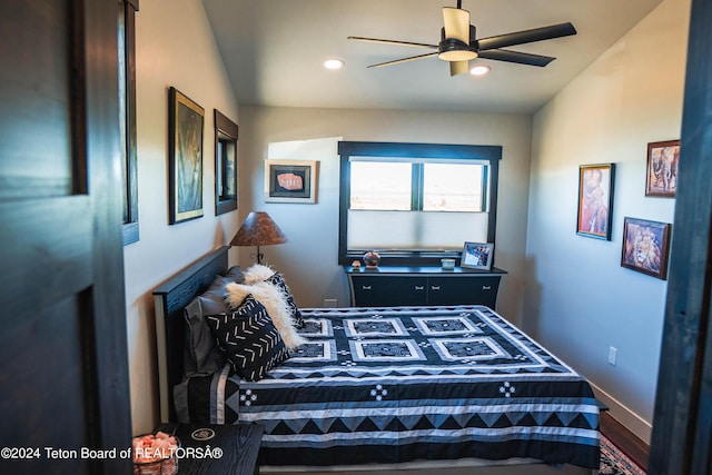 bedroom featuring ceiling fan and lofted ceiling