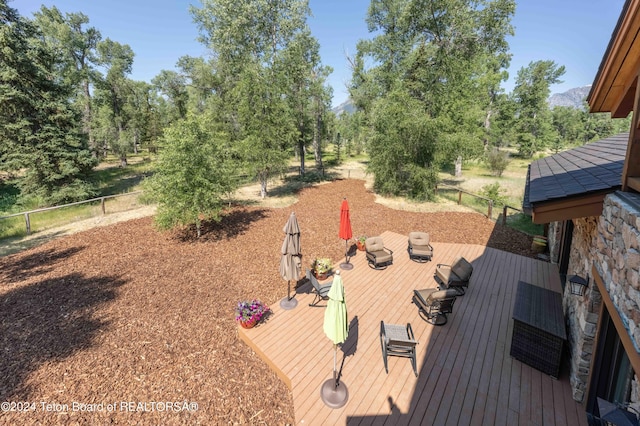 155 E Buck Mountain Rd, Jackson, WY 83001 - view of yard with fence and a wooden deck