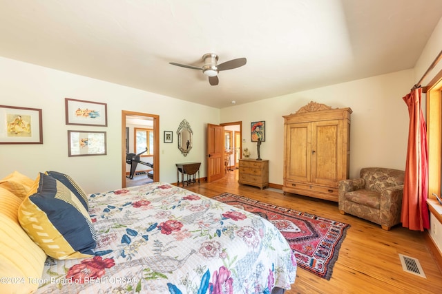 bedroom featuring ceiling fan and light wood-type flooring