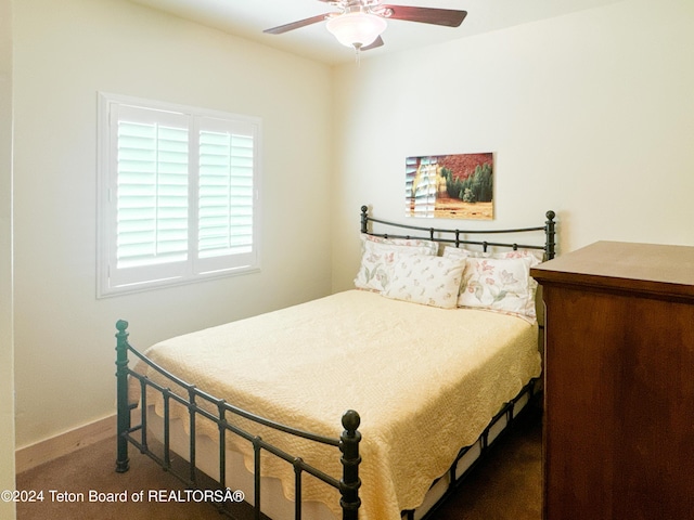 bedroom with ceiling fan and carpet flooring