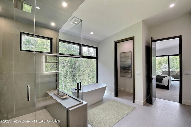 6 Blackfoot Trl, Victor, ID 83455 - bathroom featuring visible vents, a soaking tub, recessed lighting, a stall shower, and connected bathroom