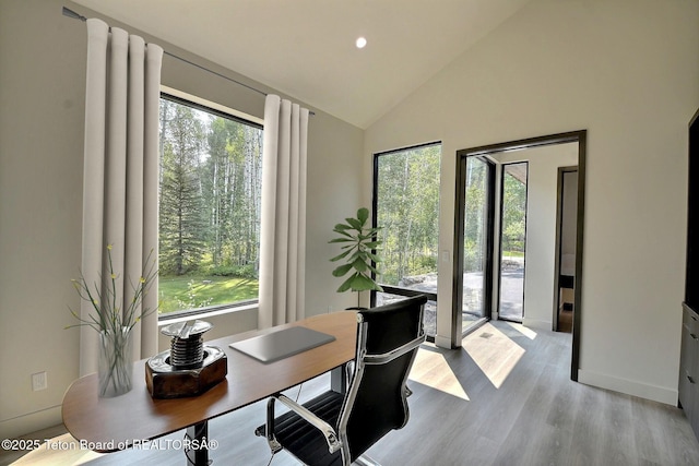 6 Blackfoot Trl, Victor, ID 83455 - office area with recessed lighting, wood finished floors, a wealth of natural light, and high vaulted ceiling
