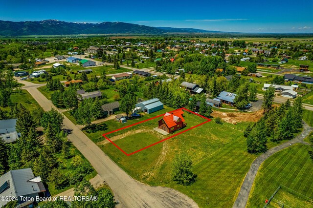 bird's eye view with a mountain view