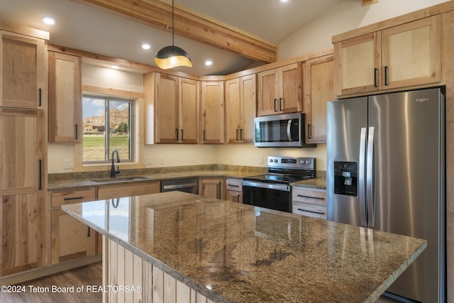 1424 Fairview Dr, Dubois, WY 82513 - kitchen with appliances with stainless steel finishes, light brown cabinetry, recessed lighting, beam ceiling, and dark stone countertops