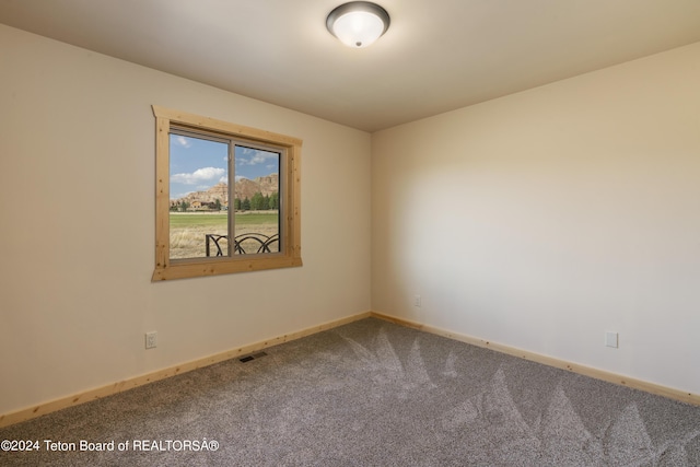 1424 Fairview Dr, Dubois, WY 82513 - carpeted empty room featuring baseboards